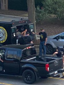 Images of Proud Boys dressed in yellow and black with custom insignia at the Capitol in Atlanta June 25 2022